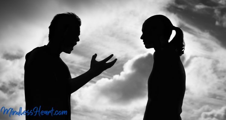 man explaining to woman